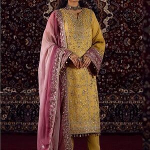 Elegant Yellow Embroidered Women Salwar with Pink Dupatta